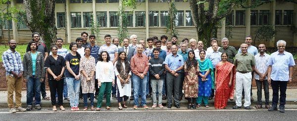 Group picture of the organization consisting of forty people women and men.